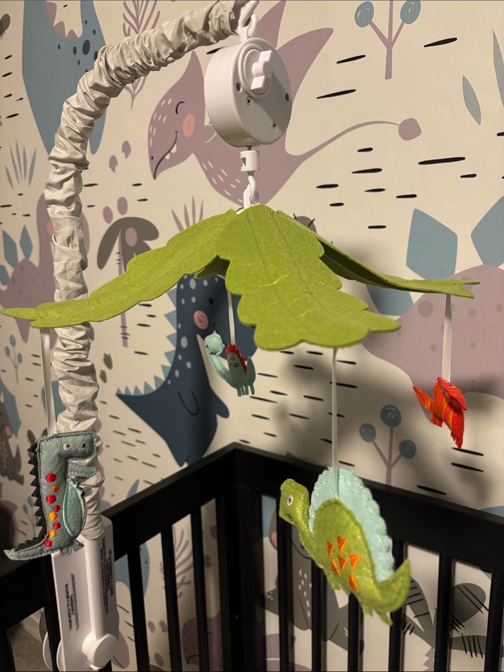 Crib Mobile with felt dinosaurs, plays music